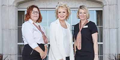 Sherrie Hewson Hawthorns Braintree smiling staff building entrance